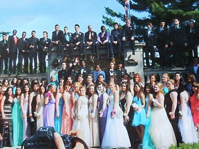 Wayne Hillman, chairman of the Windsor Veterans Memorial Services Committee, says veterans are upset that young people have taken pictures during prom time of themselves climbing on war memorials. This is an example of a group photo taken on the memorial.