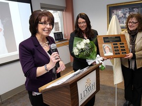 Rita Di Biase, left, is presented with the 2015 Registered Nurses Association of Ontario, Windsor-Essex Lois A. Fairley Nursing Award by Dana Boyd and last years winner Ava Lewis at the Leamington Hospital on Wednesday, April 22, 2015.