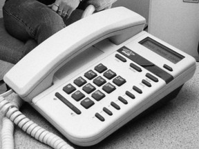 An old phone in a 1997 file photo. (Jason Kryk / The Windsor Star)