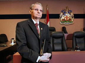 Pastor Ernie Harris is shown Wednesday, April 15, 2105, inside the City of Windsor council chambers. He is upset that the Supreme Court of Canada has found prayers at council meetings are a violation of Charter rights.   (DAN JANISSE/The Windsor Star)