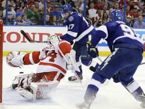 Tampa Bay Lightning centre Alex Killorn (17) beats Detroit Red Wings goalie Petr Mrazek for a goal during the second period of Game 2 of a first-round NHL Stanley Cup hockey playoff series Saturday, April 18, 2015, in Tampa, Fla. (AP Photo/Chris O'Meara)