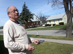 Foch Avenue resident Denis Meloche stands in front of his home in Windsor, Ont. on April 15, 2015. The City of Windsor has identified McDougall Avenue as one of the roads with the most complaints. Meloche lives on Foch Avenue and uses McDougall daily to travel to and from his home. (DYLAN KRISTY/The Windsor Star)