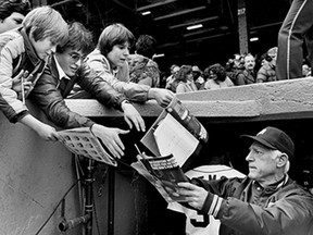 April 9, 1983 - TIGER MANAGER Sparky Anderson takes time out before Detroit's home opener to sign autographs for youngsters.  Tigers lost to Chicago White Sox, 6-3. (Tim McKenna/Windsor Star)