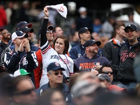 Tiger fans celebrate Opening Day of the 2015 Detroit Tigers season as they take on the Minnesota Twins at Comerica Park, Monday, April 6, 2015. (DAX MELMER/The Windsor Star)