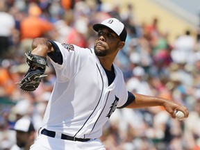 FILE- In this March 21, 2015, file photo, Detroit Tigers starting pitcher David Price throws during the first inning of a spring training exhibition baseball game against the New York Mets in Lakeland, Fla. Tigers will start the season Monday, April 6, with Price as the opening-day pitcher. For the first time since 2007, Justin Verlander won't be the opening-day starter. (AP Photo/Carlos Osorio, File)