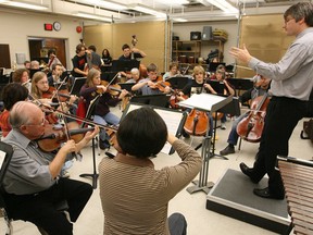 Peter Wiebe (far right) conducts the Windsor Community Orchestra during a rehearsal in this 2007 file photo. (Scott Webster / The Windsor Star)