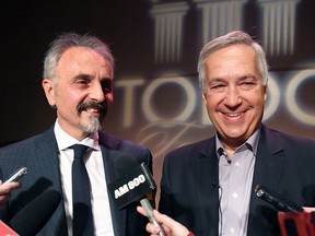 Stephen Savage, chair of the Windsor Symphony Orchestra (L) and Tony Toldo, of the Toldo Foundation speak to reporters at a media conference on Tuesday, April 7, 2015, at the Capitol Theatre in Windsor, Ont. regarding a $500,000 donation to the WSO. (DAN JANISSE/The Windsor Star)
