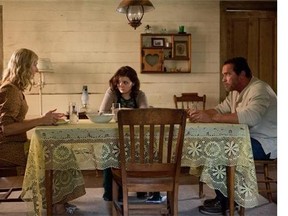 In this image released by Roadside Attractions, Joely Richardson, from left, Abigail Breslin and Arnold Schwarzenegger appear in a scene from "Maggie." (Tracy Bennett/Roadside Attractions via AP)