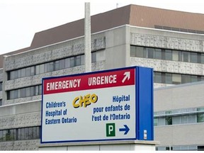 A sign directing visitors to the emergency department is shown at the Childrens Hospital of Eastern Ontario, Friday, May 15, 2015 in Ottawa. A tally done by the Children's Hospital of Eastern Ontario found that roughly 45 per cent of the 72,500 kids who were seen in the emergency room in the last fiscal year had health problems that were of ‚Äúlow acuity.‚Äù That means they were not urgent or severe. THE CANADIAN PRESS/Adrian Wyld