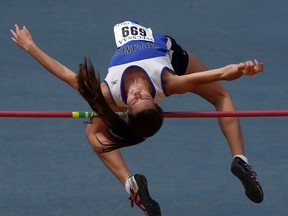 Anca Enache competes in the high jump during a WECSSAA Track and Field meet at Alumni Field at the University of Windsor on Monday, May 11, 2015.              (TYLER BROWNBRIDGE/The Windsor Star)