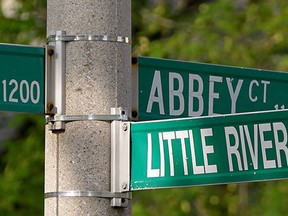 Abbey Court street sign in Little River Acres on Victoria Day, Monday May 18, 2015.  A grease fire caused damage to a home in the 1100 block of Abbey Court Sunday May 17, 2015.