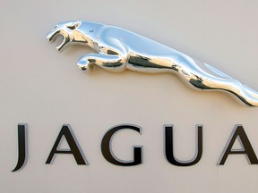 A Jaguar sign stands at a Jaguar/Land Rover dealership March 26, 2008 in Utica, Michigan. (Photo by Bill Pugliano/Getty Images)