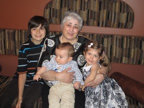 Pam Mady’s mother, Margie Brajak, with grandkids Carter, Nathan and Livi.