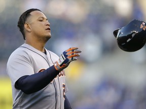 Detroit Tigers' Miguel Cabrera tosses his helmet after being left on base during the first inning a baseball game against the Kansas City Royals at Kauffman Stadium in Kansas City, Mo., Thursday, April 30, 2015. (AP Photo/Orlin Wagner)