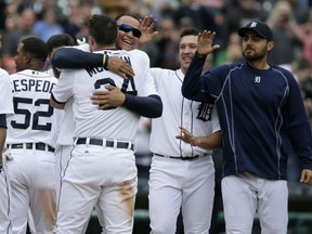 ames McCann #34 of the Detroit Tigers receives a hug from Miguel Cabrera #24 of the Detroit Tigers after hitting a solo walk-off home run to defeat the Houston Astros 6-5 in the 11th inning at Comerica Park on May 21, 2015 in Detroit, Michigan. (Photo by Duane Burleson/Getty Images)
