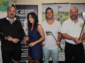 Doug Hogan, left, Houida Kassem, Windsor Essex County Cancer Centre Foundation, Spits head coach Bob Boughner and Dan Hogan, right, are a formidable foursome preparing for the Joe Hogan Memorial Golf Tournament, Thursday May 28, 2015. The 18th annual Joe Hogan Memorial Golf Tournament, scheduled for September 10,2015, has raised over $500,000 for the Windsor and Essex County Cancer Centre Foundation. (NICK BRANCACCIO/The Windsor Star).