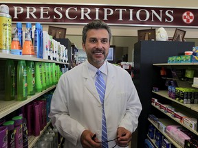 Pharmacist Gus Spanic at his Lanoue Street pharmacy Friday May 29, 2015. (NICK BRANCACCIO/The Windsor Star).
