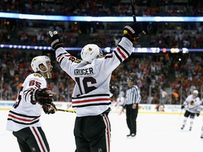 Marcus Kruger #16 of the Chicago Blackhawks celebrates scoring the game winning goal over the Anaheim Ducks in triple overtime of Game Two of the Western Conference Finals during the 2015 NHL Stanley Cup Playoffs at Honda Center on May 19, 2015 in Anaheim, California. The Chicago Blackhawks won the game 3-2.  (Photo by Stephen Dunn/Getty Images)