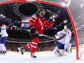 Forward Taylor Hall celebrates as his teammate forward Tyler Seguin scores past goalkeeper Ronan Quemener of France during the 2015 IIHF Ice Hockey World Championships on May 9, 2015 at the O2 Arena in Prague. Canada won the match 4-3. (JONATHAN NACKSTRAND/AFP/Getty Images)