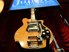 Musician George Harrison's Mastersound Electric guitar is pictured before an auction start at the Hard Rock Cafe in New York on May 15, 2015. The guitar played by Harrison in the Beatles' early days, previously on display in a British museum, goes on auction in New York on May 15, valued at $400,000 to $600,000 USD. The electric guitar is the two-day auction's star item, amid hundreds of possessions once owned by rock 'n' roll's biggest stars, which auctioneers hope will rake in millions. AFP PHOTO/JEWEL SAMADJEWEL SAMAD/AFP/Getty Images