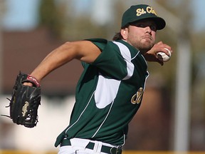 Saints pitcher, Rob Cooper, pitches during the 7th inning of game one between the St. Clair Saints and the Brock Badgers at Lacasse Park, Sunday, Oct. 26, 2014.  (DAX MELMER/The Windsor Star)