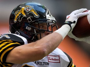 Former Essex Raven Andy Fantuz makes a reception against the B.C. Lions during the first half of a CFL football game in Vancouver, B.C., on Friday August 8, 2014. (THE CANADIAN PRESS/Darryl Dyck)
