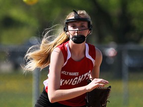 Holy Names's Jordyn Dawson fires the ball to first while playing Herman at Jackson Park in Windsor on Thursday, May 7, 2015.                    (TYLER BROWNBRIDGE/The Windsor Star)