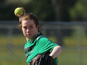 Herman's Jordyn Hryniw throws the ball to first while playing against Holy Names at Jackson Park in Windsor on Thursday, May 7, 2015.                    (TYLER BROWNBRIDGE/The Windsor Star)