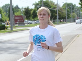 Portrait of Faith Mills who is running this weekend in the first ever Alzheimer's run locally,  in memory of her father, Brian Karr who developed the disease at the young age of 52, and and died at 58. (JASON KRYK/The Windsor Star)