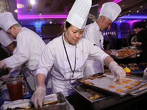Jamie Chu from Legends prepares sliders at the annual Battle of the Hors D'oeuvres at Caesars Windsor in Windsor on Thursday, May 21, 2015.              (TYLER BROWNBRIDGE/The Windsor Star)
