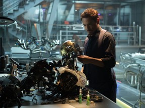 This photo provided by Disney/Marvel shows, Robert Downey Jr. as Iron Man/Tony Stark in the film, "Avengers: Age Of Ultron." The movie releases in U.S. theaters on May 1, 2015. (Jay Maidment/Disney/Marvel via AP)