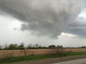 A heavy black cloud turned in to a storm that cut through Windsor on May 11, 2015. A tornado watch is still in effect. (Jason Kryk/The Windsor Star)