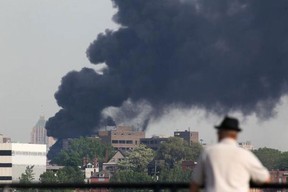 Black smoke fills the skyline after a oil tanker exploded on I-75 in downtown Detroit, Sunday, May 24, 2015.  (DAX MELMER/The Windsor Star)