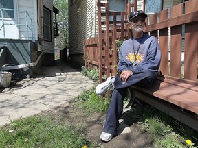 Richard Milne, who lives in the 500 block of Church St. is shown on Thursday, May 7, 2015, where officials where investigating an overnight fire at a nearby home. He is worried about the recent arsons in the neighbourhood.  (DAN JANISSE/The Windsor Star)