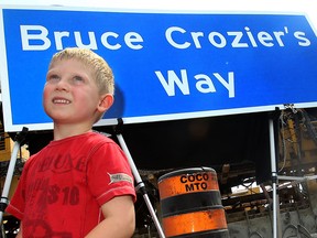 Files: A ceremony was held Friday, Sept. 2, 2011, in Tecumseh to dedicate a portion of Highway 3 in honour of the late Bruce Crozier. Crozier's grandson Cowan Crozier is all smiles during the event. (DAN JANISSE/The Windsor Star)