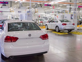 In this July 12, 2013, photo, Passat sedans are lined up to be tested at the Volkswagen plant in Chattanooga, Tenn. Export Development Canada is lending Germany's Volkswagen Group 400 million euros in a move to boost sales by Canadian suppliers to the global auto giant. THE CANADIAN PRESS/AP-Erik Schelzig