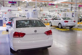 In this July 12, 2013, photo, Passat sedans are lined up to be tested at the Volkswagen plant in Chattanooga, Tenn. Export Development Canada is lending Germany's Volkswagen Group 400 million euros in a move to boost sales by Canadian suppliers to the global auto giant. THE CANADIAN PRESS/AP-Erik Schelzig