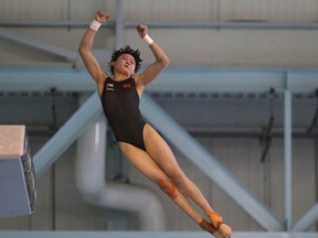 China's Qian Ren competes in the women's 10m platform at the Fina Diving World Series at the Windsor International Aquatic and Training Centre in Windsor, Sunday, May 24, 2015.  (DAX MELMER/The Windsor Star)