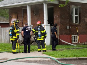 Windsor police and fire crews tend to a suspected arson in an abandoned home on Felix Ave., Sunday, May 10, 2015. (JESSELYN COOK/The Windsor Star)