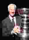 Hockey legend Gordie Howe, shown here posing with the Stanley Cup in Calgary last April, will be parade marshall at the Winter Fest Holiday Parade Saturday.â Ted Rhodes photo/ Calgary Herald