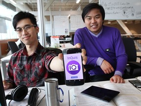 University of Windsor graduates Scott Nguyen (L) and Jimmy Truong are working on an app that allows students to send a digital photo of an equation or question and have it solved by a tutor.  (DAN JANISSE/The Windsor Star)