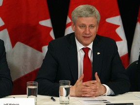 Prime Minister Stephen Harper addresses the media before a round table discussion at the Waterfront Hotel in Windsor on Wednesday, May 13, 2015.            (TYLER BROWNBRIDGE/The Windsor Star)