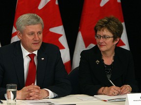 Prime Minister Stephen Harper is joined by Minister of Public Works and Government Services Diane Finley (right) as he addresses the media before a round table discussion at the Waterfront Hotel in Windsor on Wednesday, May 13, 2015.            (TYLER BROWNBRIDGE/The Windsor Star)