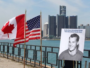 A photo of hockey great Gordie Howe was unveiled at the announcement that the Detroit River International Crossing will be named the Gordie Howe International Bridge, on the waterfront, in Windsor, Ontario, Thursday May 14, 2015. THE CANADIAN PRESS/Dave Chidley