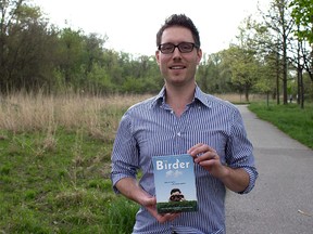 The Birder producer Jeff Nadalin holds up a DVD copy of the film during the launch at the Ojibway Nature Centre on Saturday May 9, 2015. (DYLAN KRISTY/The Windsor Star)