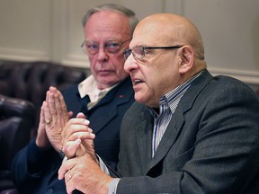 John McIntosh , left, and his lawyer Harvey Strosberg are shown during a media conference on Thursday, May 21, 2015, in Windsor, ON. regarding a class action lawsuit against air bag manufacturer Takata Corp. of Japan. (DAN JANISSE/The Windsor Star)