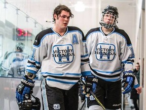 Plymouth's Luke Boka, left, had 16 goals and 33 points in 31 games with Detroit Victory Honda last year. (Courtesy of Windsor Spitfires)