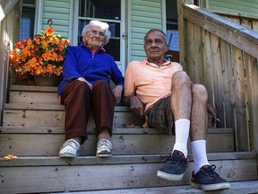 Residents Bernadette Lesperance, 91, and Wayne Sandor, 67, say a neglected house on Brock Street is causing damage to their properties. (JESSELYN COOK/The Windsor Star)