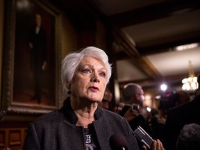Ontario's Education Minister Liz Sandals scrums with the media following question period at Queen's Park in Toronto on Tuesday, March 3, 2015. THE CANADIAN PRESS/Chris Young