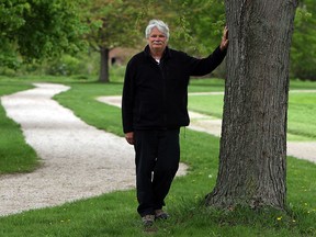 Jay Affleck, the Essex Parks and Facilities supervisor, is photographed along a stretch of trail that runs in Harrow on Wednesday, May 13, 2015.            (TYLER BROWNBRIDGE/The Windsor Star)